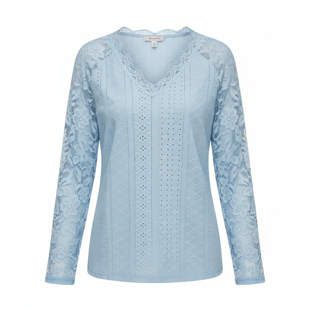 Light blue lace top worn by a person with a neutral background